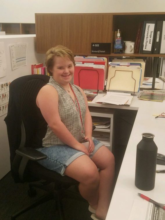 Chelsea Bailey sitting in Scholastic Press office Aug 15,2019